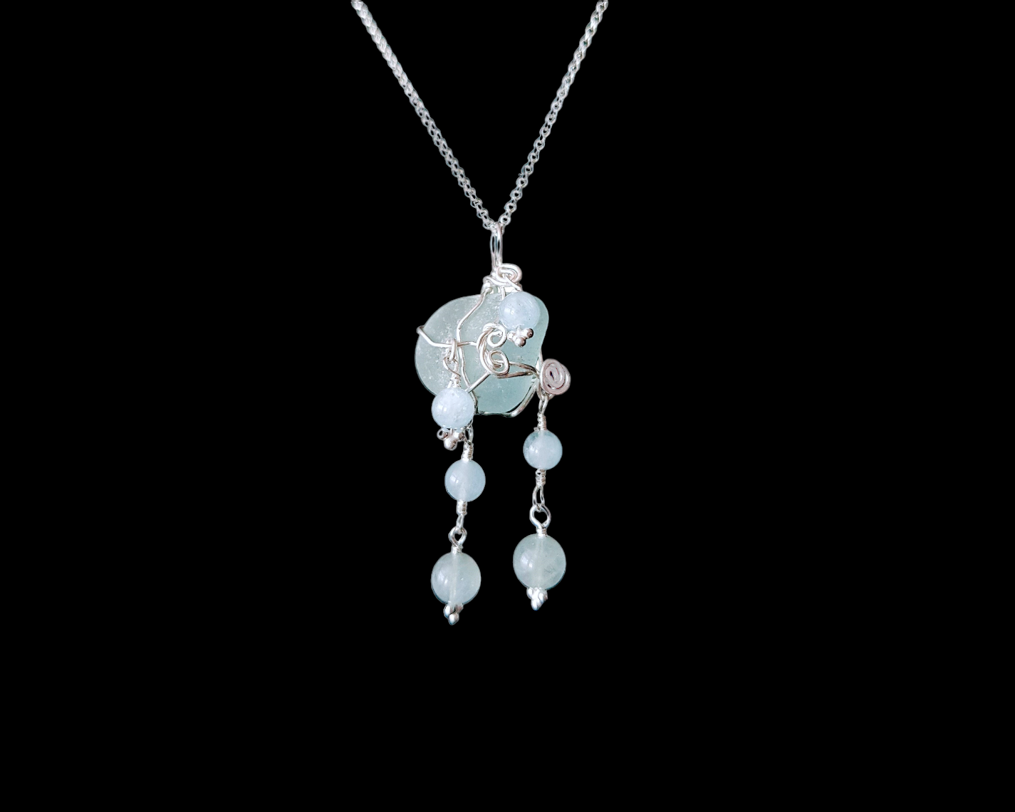 Aquamarine Sea Glass/Beach Glass Water Pendant. Wire wrapped aqua blue beach glass pendant with genuine Aquamarine dangles. Pendant on a fine diamond cut rolo chain.  