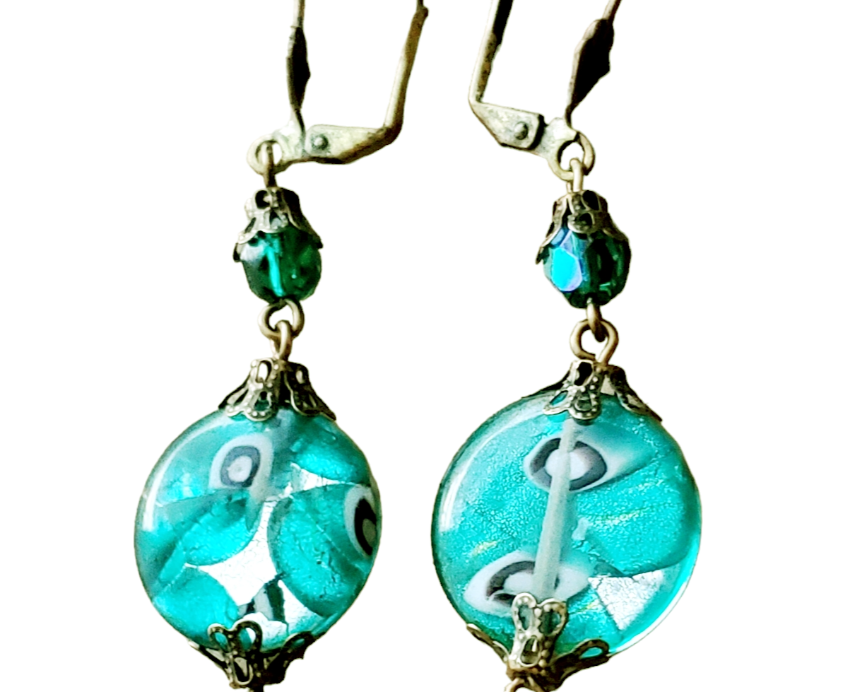 Long Luminous Teal foil Glass Earrings with sparkly crystal glass beads with antiqued brass metal and leaver back earring hooks.