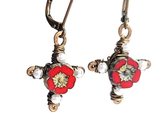Antique Style Red Flower Cross, Vintage Inspired Cross Earrings with red flowers in the centre and tiny white pearls on the four points of the cross made with antiqued brass metal.