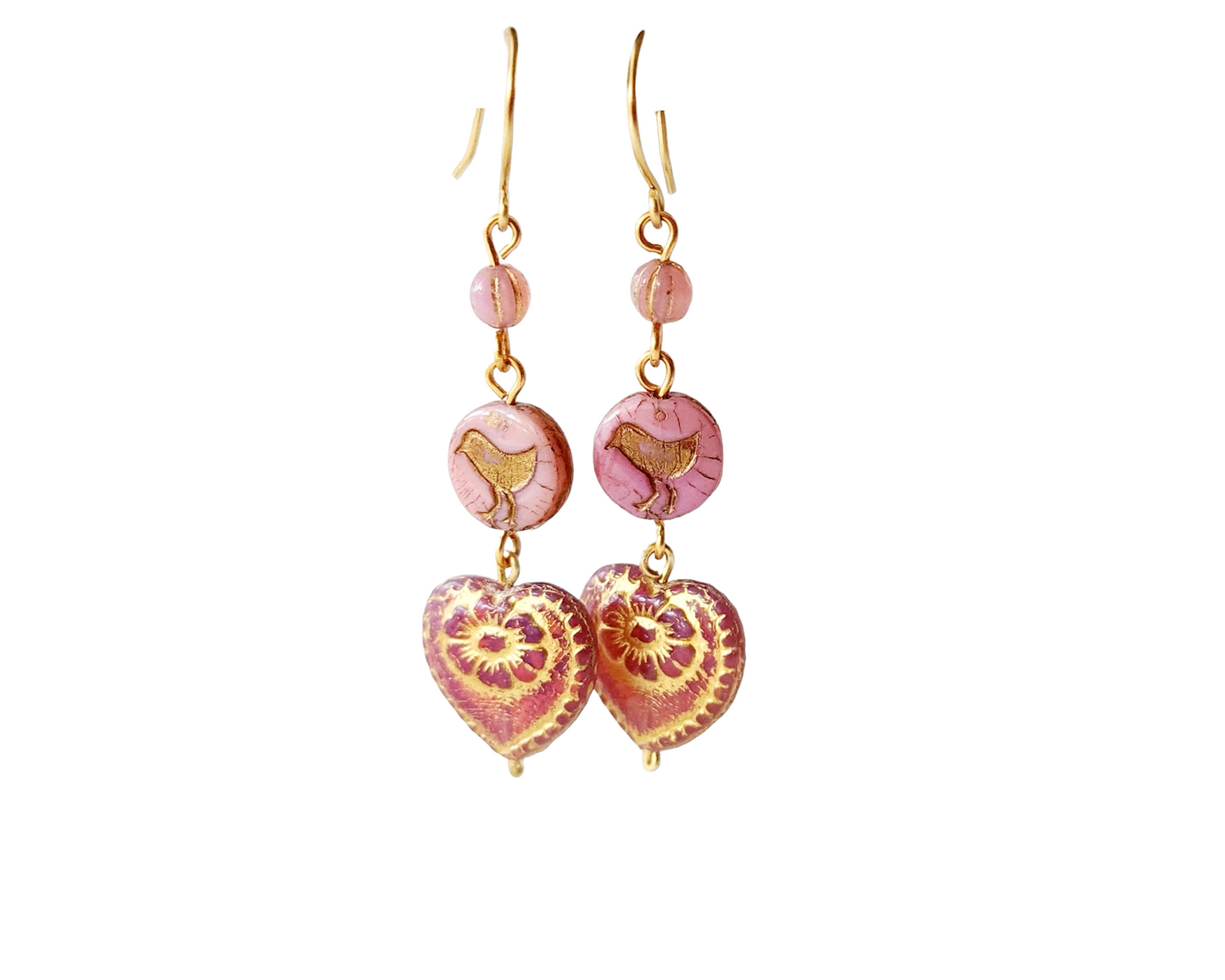 Long Pink Heart Rose Sparrow Earrings with opaque pink glass beads, large pink hearts with gold detail and round pink beads with gold birds and round melon beads with gold detail on french earrings hook. 
