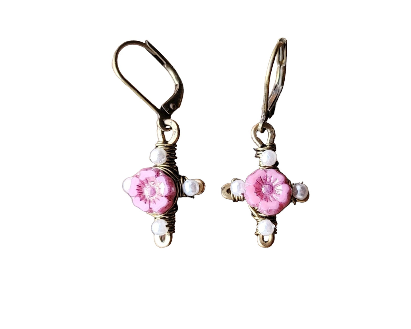 Antique Style Pink Flower Cross, Vintage Inspired Cross Earrings with red flowers in the centre and tiny white pearls on the four points of the cross made with antiqued brass metal.