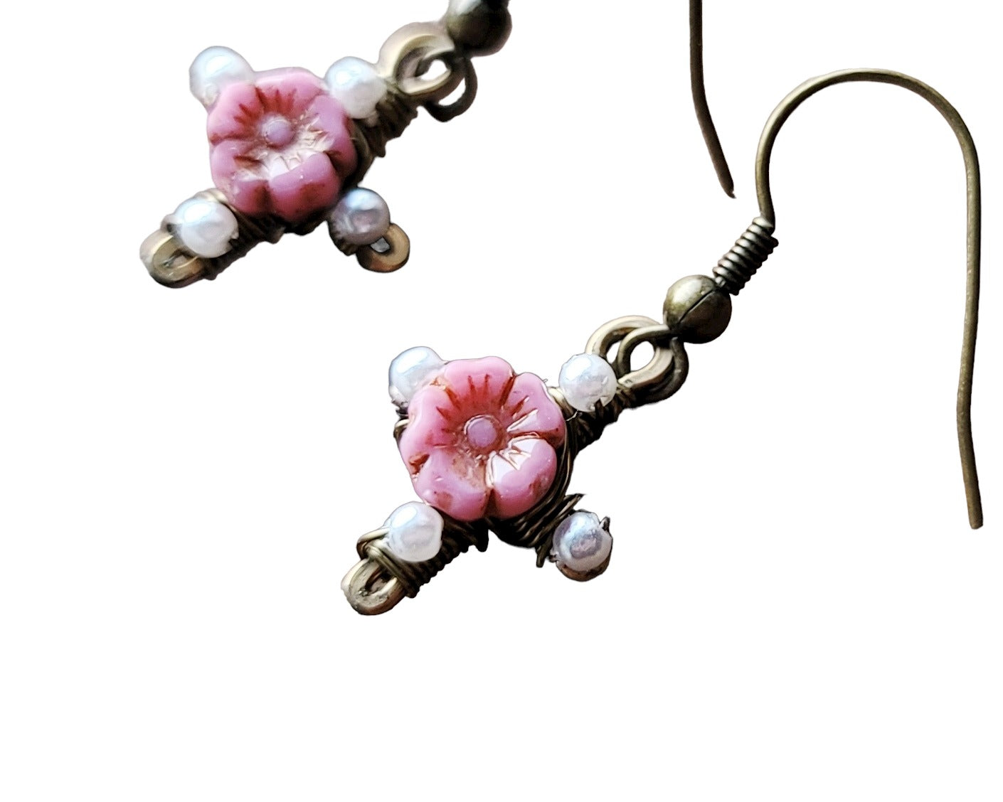 Antique Style Pink Flower Cross, Vintage Inspired Cross Earrings with red flowers in the centre and tiny white pearls on the four points of the cross made with antiqued brass metal.