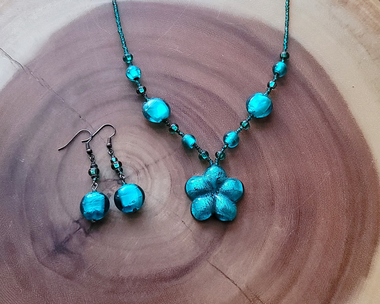 Luminous Teal Flower Necklace and Dangle Earring Set, a beaded teal, blue foil glass flower Necklace and Earrings