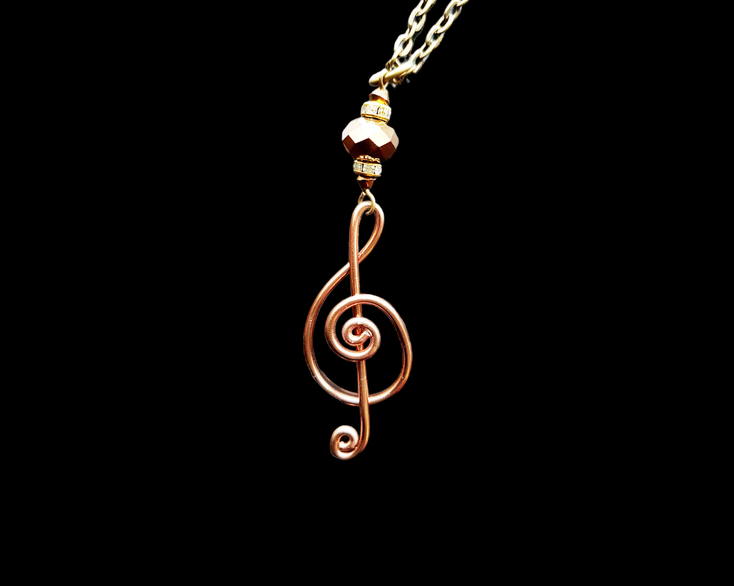 Warm Romance Treble Clef Pendant Necklace with Bronze Treble cleft, Gold Crystal, on a Long Chain