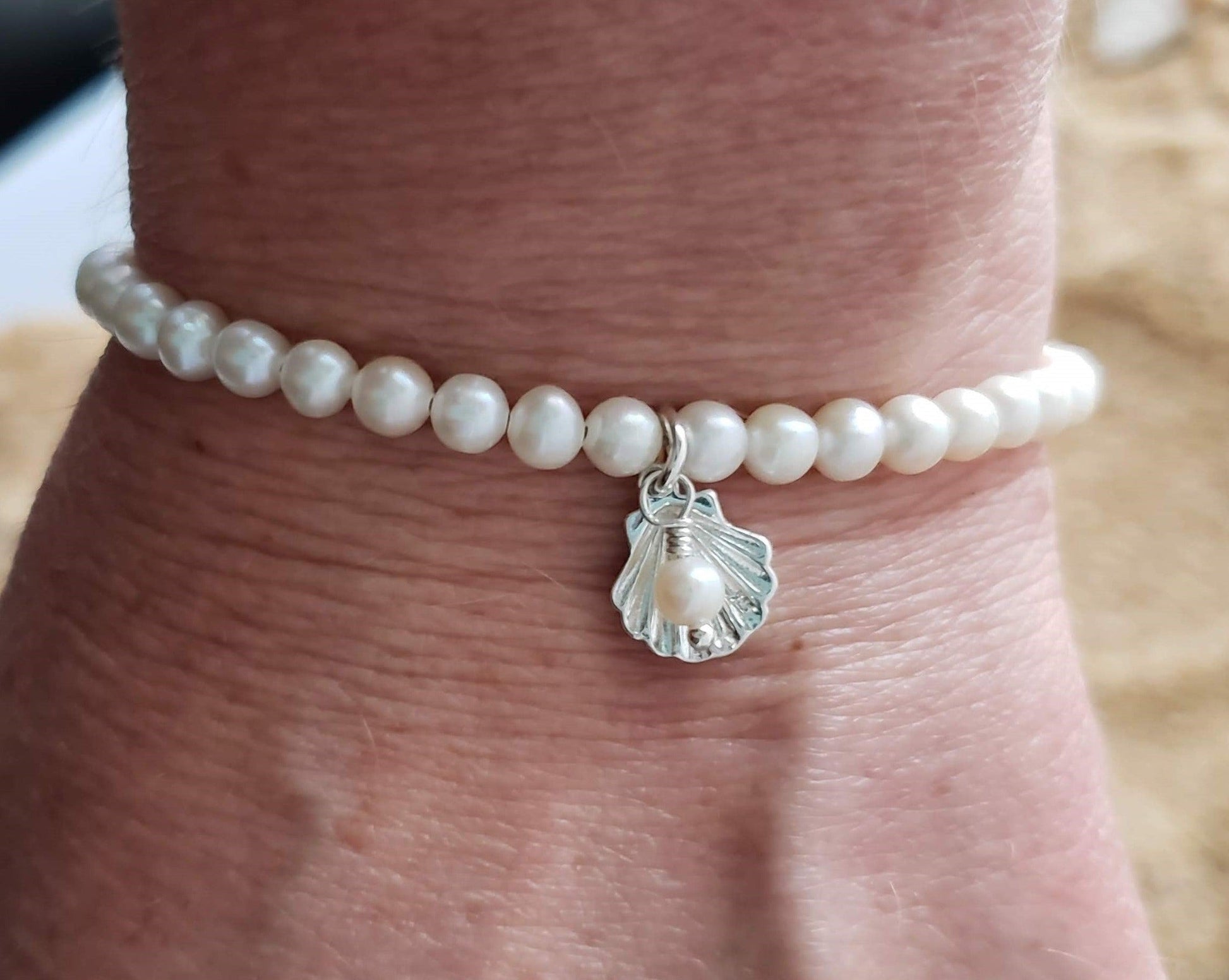 Deluxe Genuine Pearl Shell Bracelet-Sterling Silver-White Freshwater Cultured Pearls with Sterling Silver Shell pendant and dangling Pearl