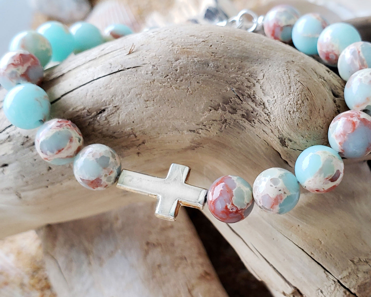 Sideways Cross and Aqua blue Sea Sediment Jasper Beaded Bracelet. Sterling Silver, Lobster Claw Clasp and Extension chain. 