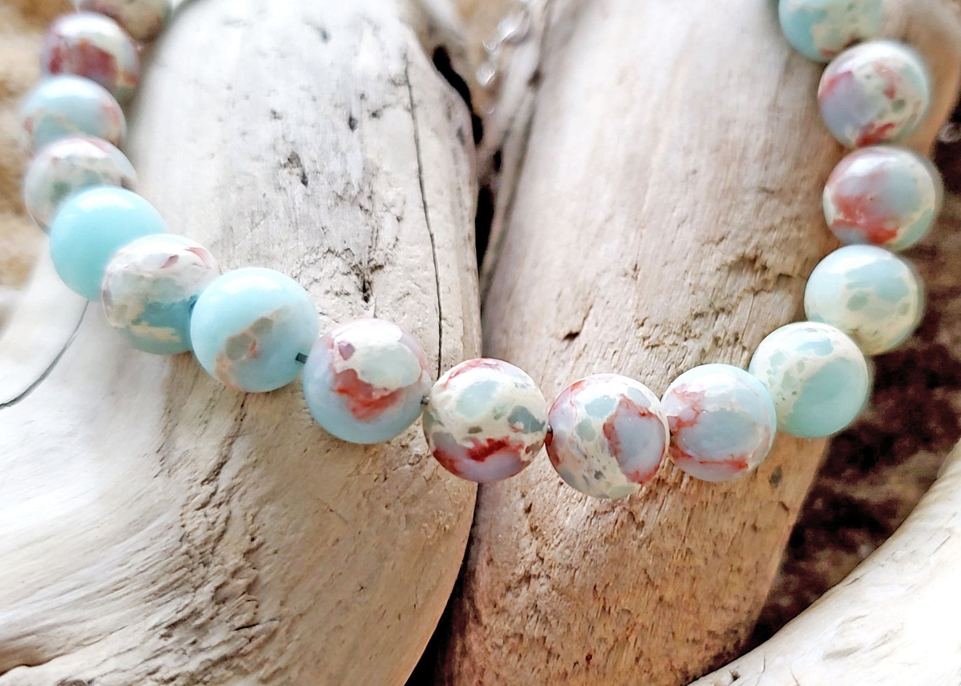 Sideways Cross and Aqua blue Sea Sediment Jasper Beaded Bracelet. 