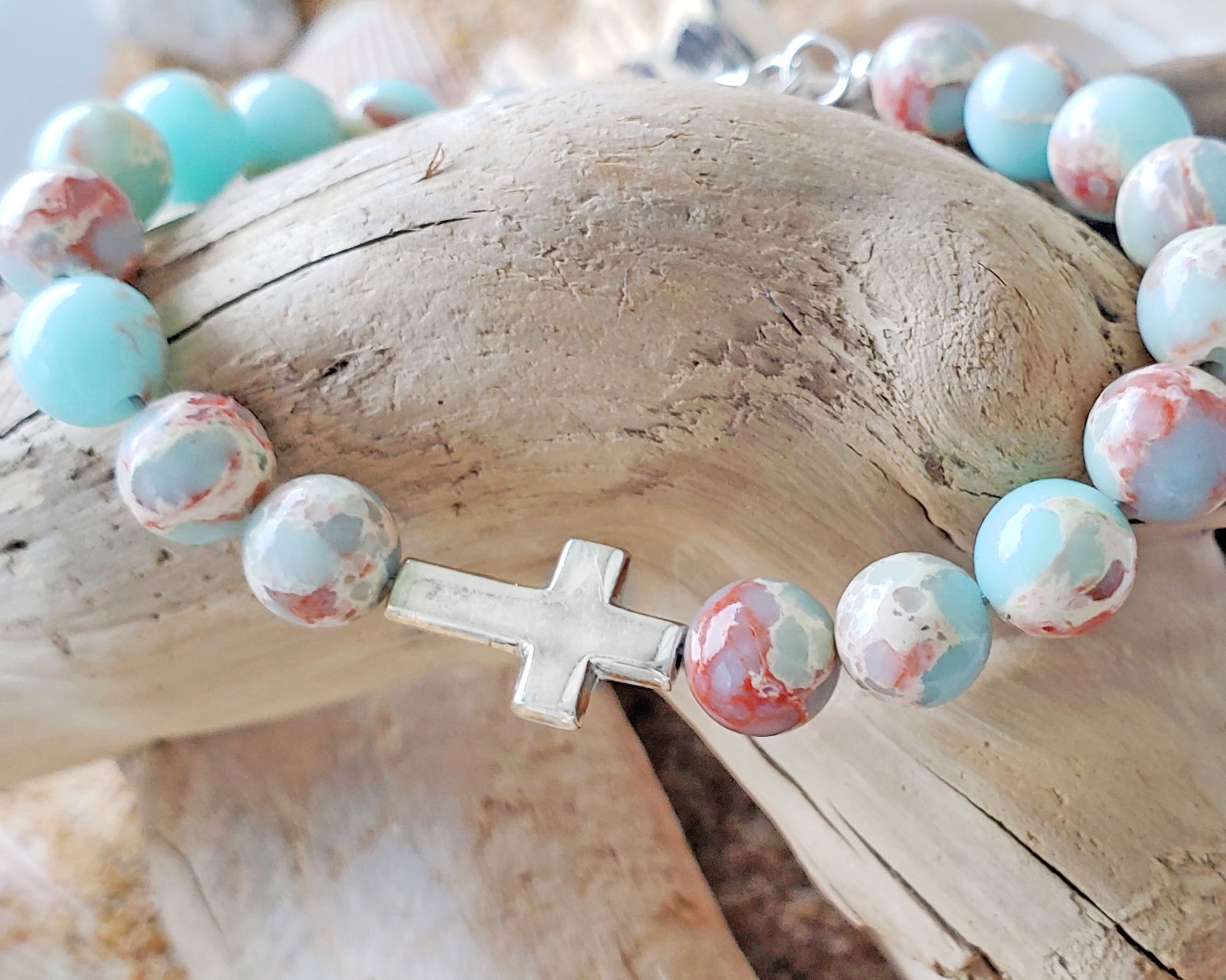 Sideways Cross and Aqua blue Sea Sediment Jasper Beaded Bracelet. Sterling Silver, Lobster Claw Clasp and Extension chain. 