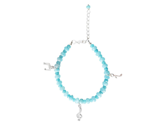 Aqua Blue Quartz Musical Beaded Charm Bracelet, A beaded Blue Gemstone Bracelet with Three Music Pendants, a Treble Clef, Quaver and an Ottava and Extension Chain.