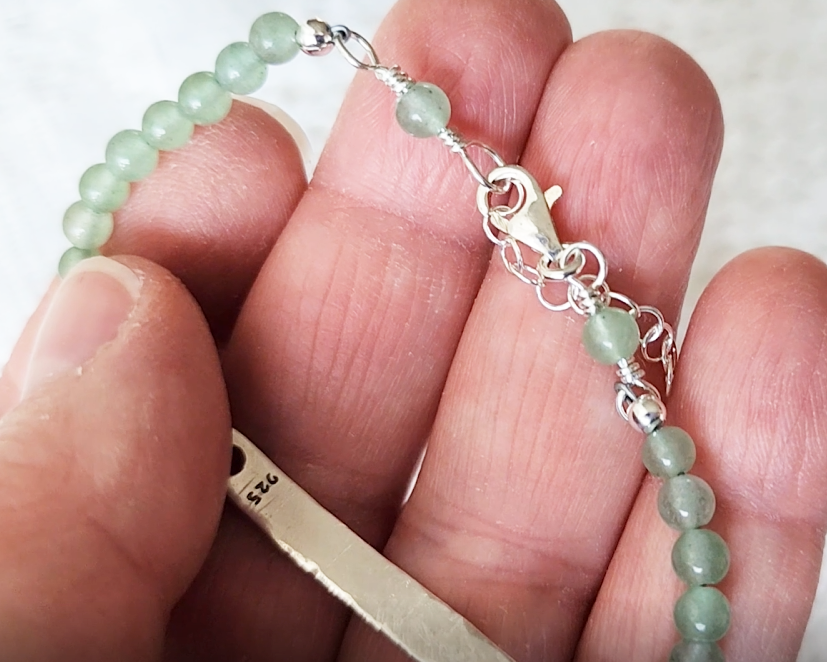 Eco Sterling Silver Aventurine Peace Bridge Bracelet with textured rectangular bar and 4mm round polished soft green Aventurine stone beads. 
