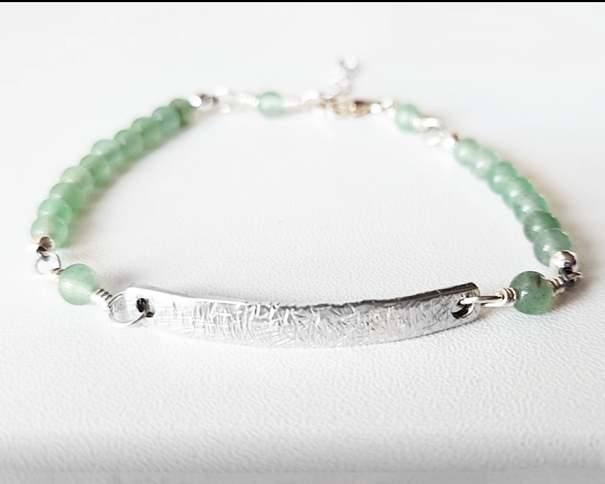 Eco Sterling Silver Aventurine Peace Bridge Bracelet with textured rectangular bar and 4mm round polished soft green Aventurine stone beads. 
