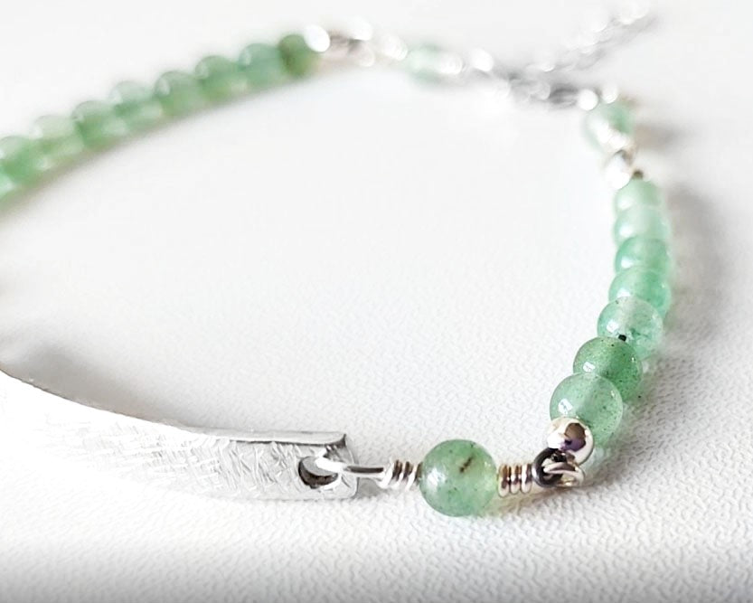 Eco Sterling Silver Aventurine Peace Bridge Bracelet with textured rectangular bar and 4mm round polished soft green Aventurine stone beads. 