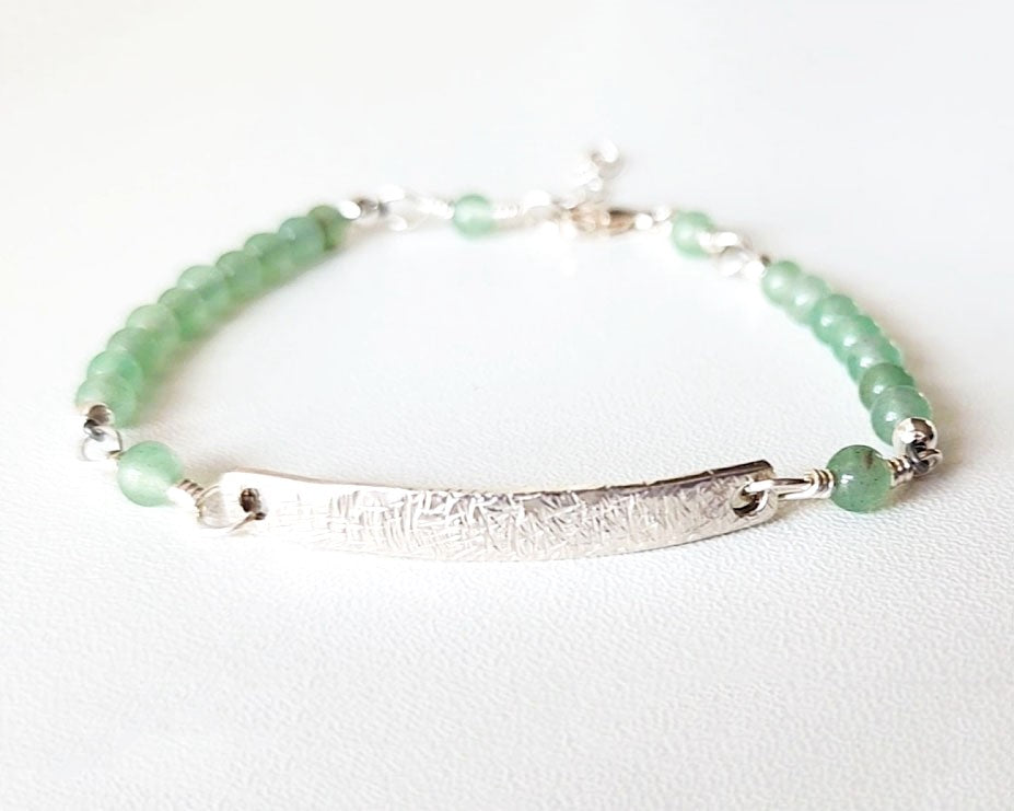 Eco Sterling Silver Aventurine Peace Bridge Bracelet with textured rectangular bar and 4mm round polished soft green Aventurine stone beads. 