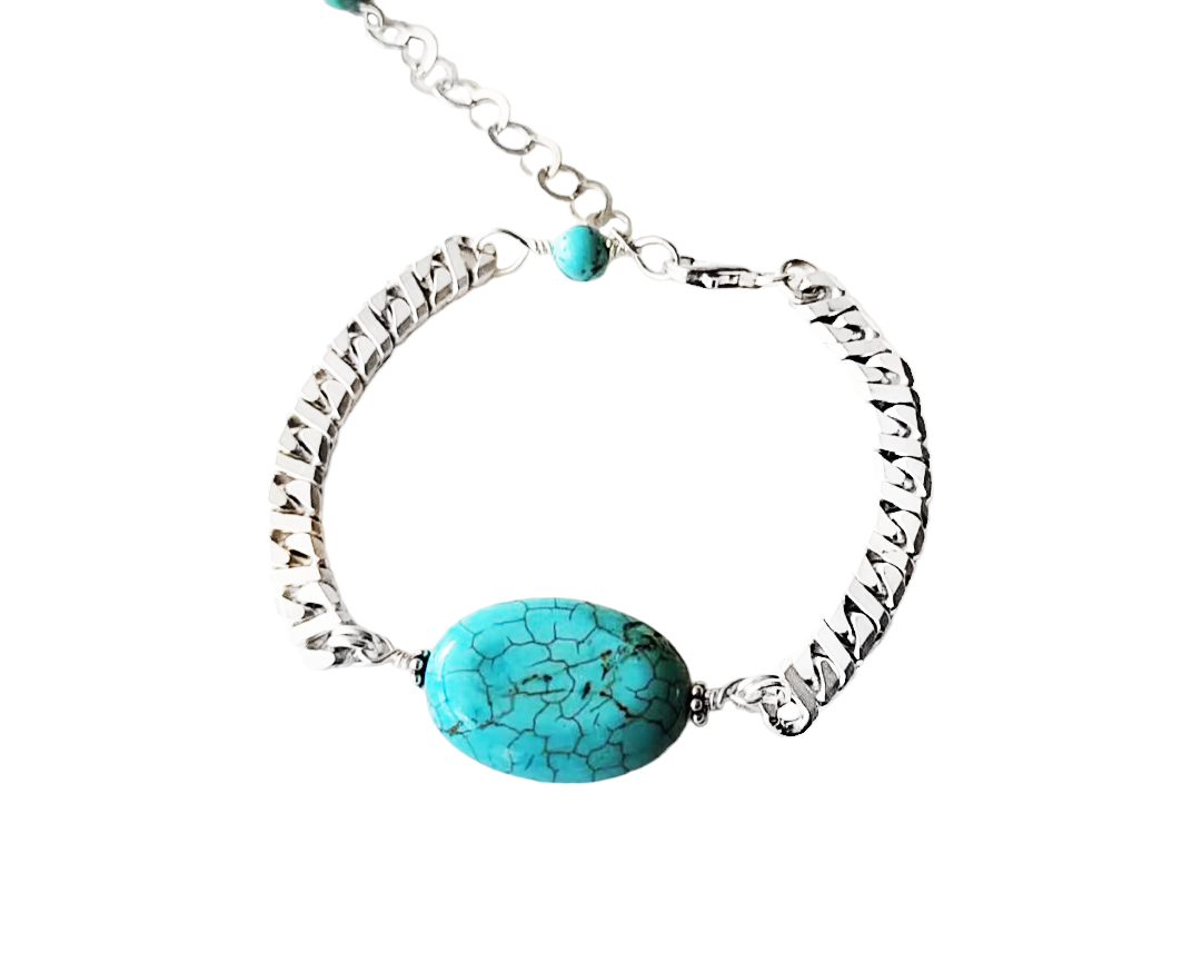 Eco Friendly Sterling Silver Turquoise Bracelet-Thick Sterling Silver Chain and an oval shaped Turquoise Stone in the centered, it has an Extension chain to make it Adjustable