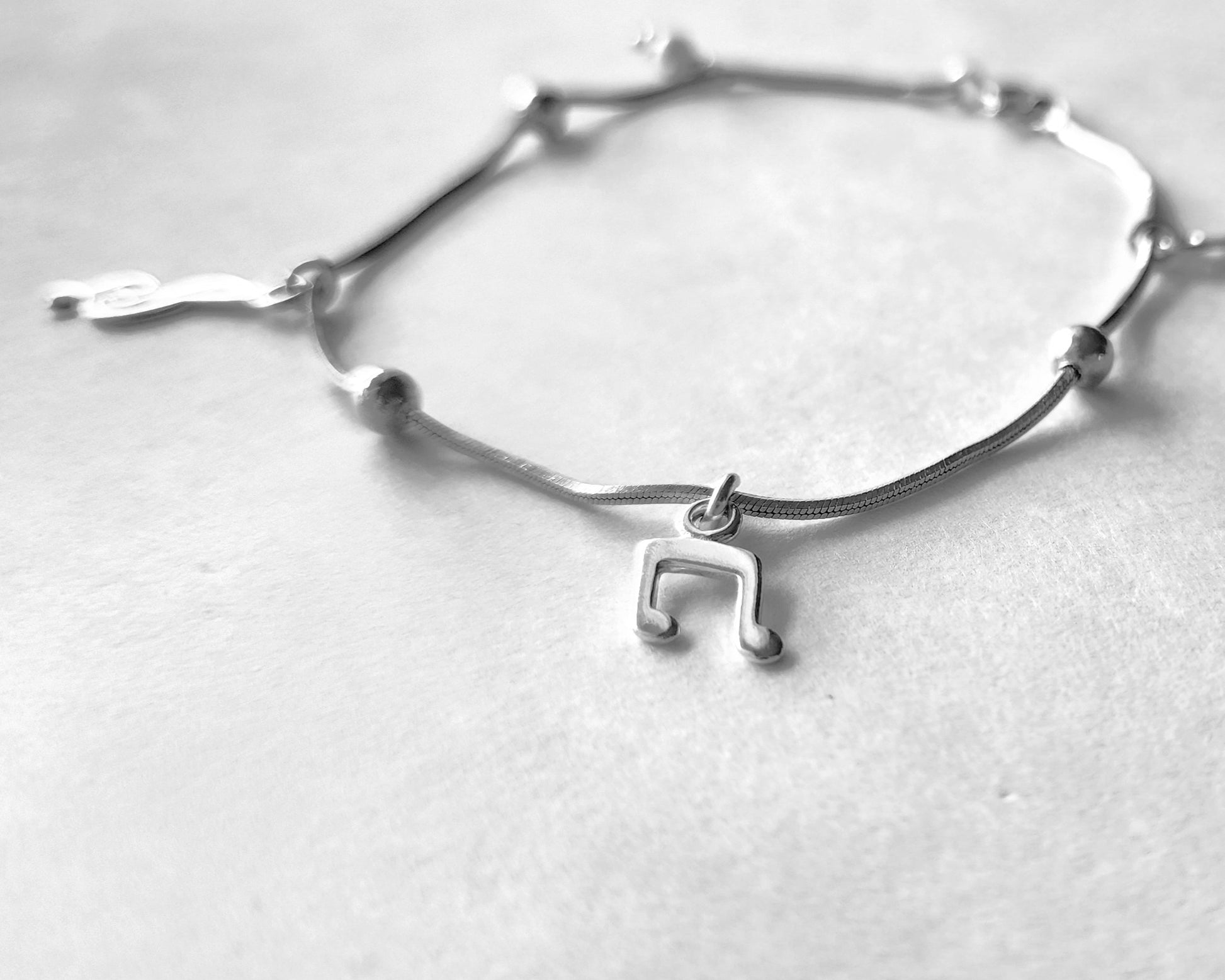 Personalized Sterling Silver Music Bracelet, charm bracelet with Musical Notes:  and Birthstone dangle. Treble Clef, Quaver & Ottava