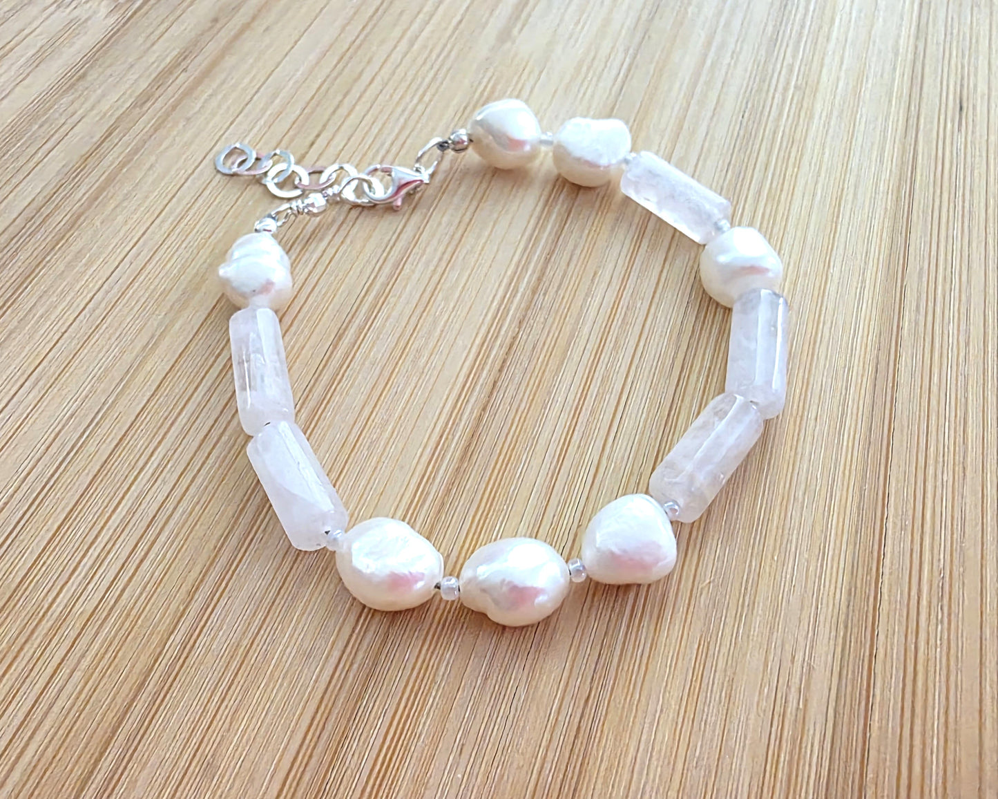 Rose Quartz & Freshwater Cultured Pearl PEACE bracelet, Morse Code spells PEACE with Pale Pink stones white Pearls & 925 Sterling Silver on wood