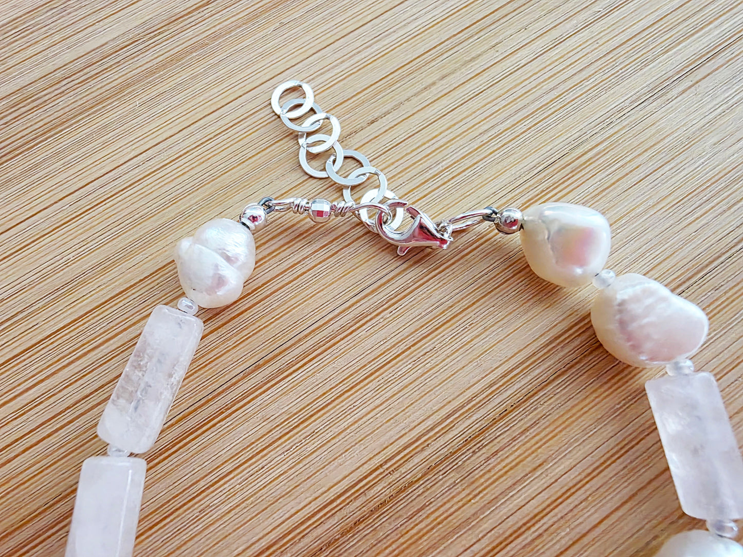 Rose Quartz & Freshwater Cultured Pearl PEACE bracelet, Morse Code spells PEACE with Pale Pink stones white Pearls & 925 Sterling Silver on wood