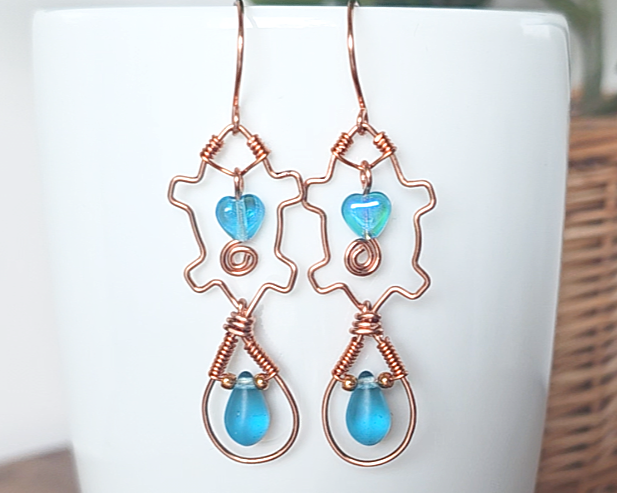 Long Copper Aqua Blue Beaver Heart Eternity Earrings