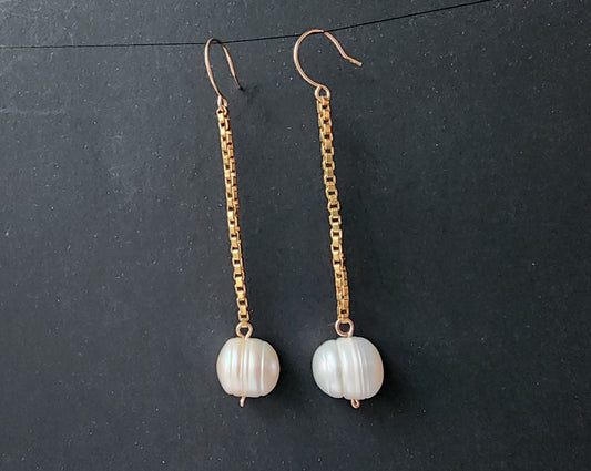 Extra-long Pearl dangle earrings with large white Freshwater Cultured Pearls dangle from 14k Gold Filled box style chain. Earring have french style earring hooks. 
