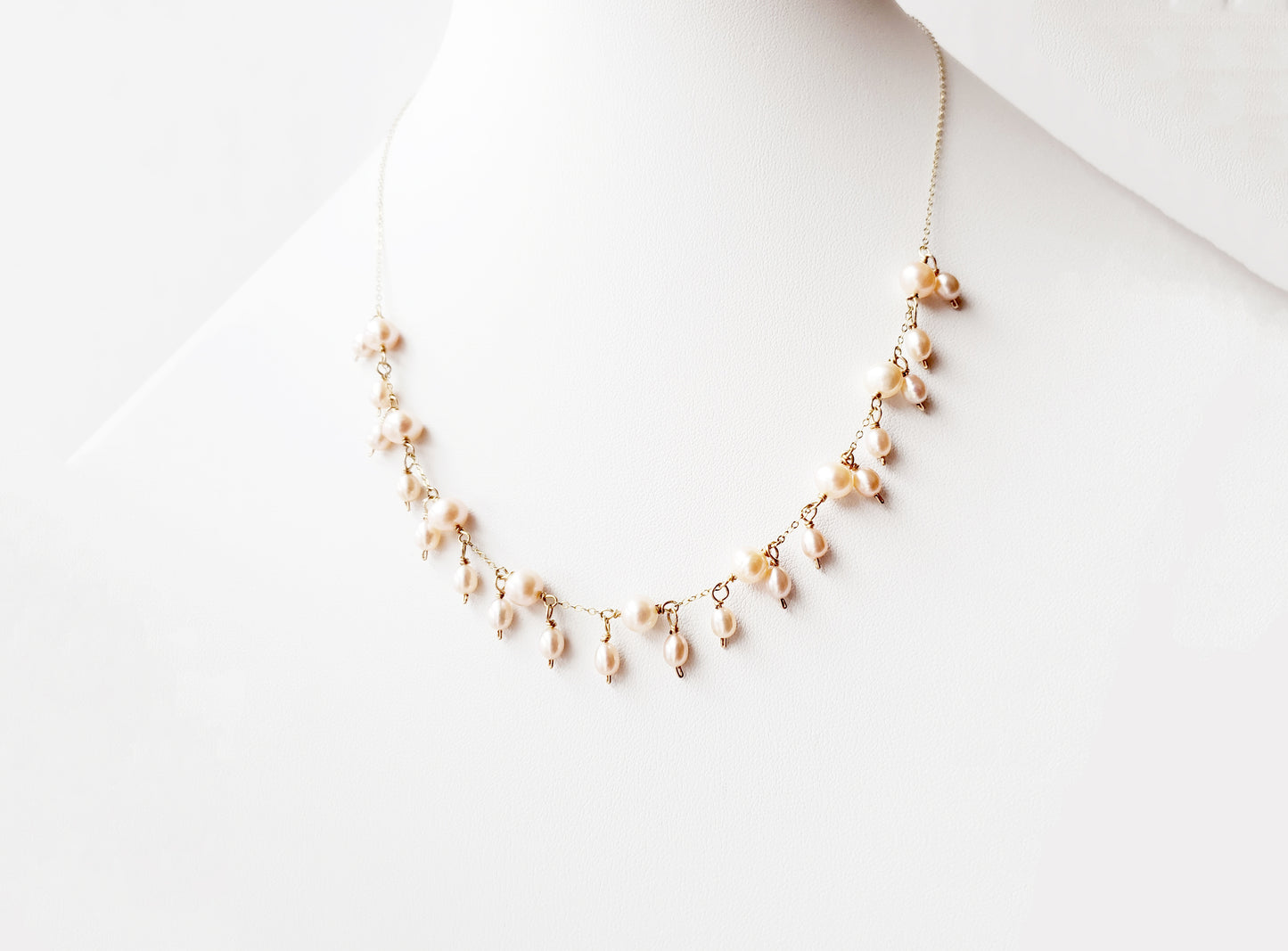 Elegant pale peach color Freshwater Cultured Pearl dangle necklace with small peach pearls and Gold Filled chain