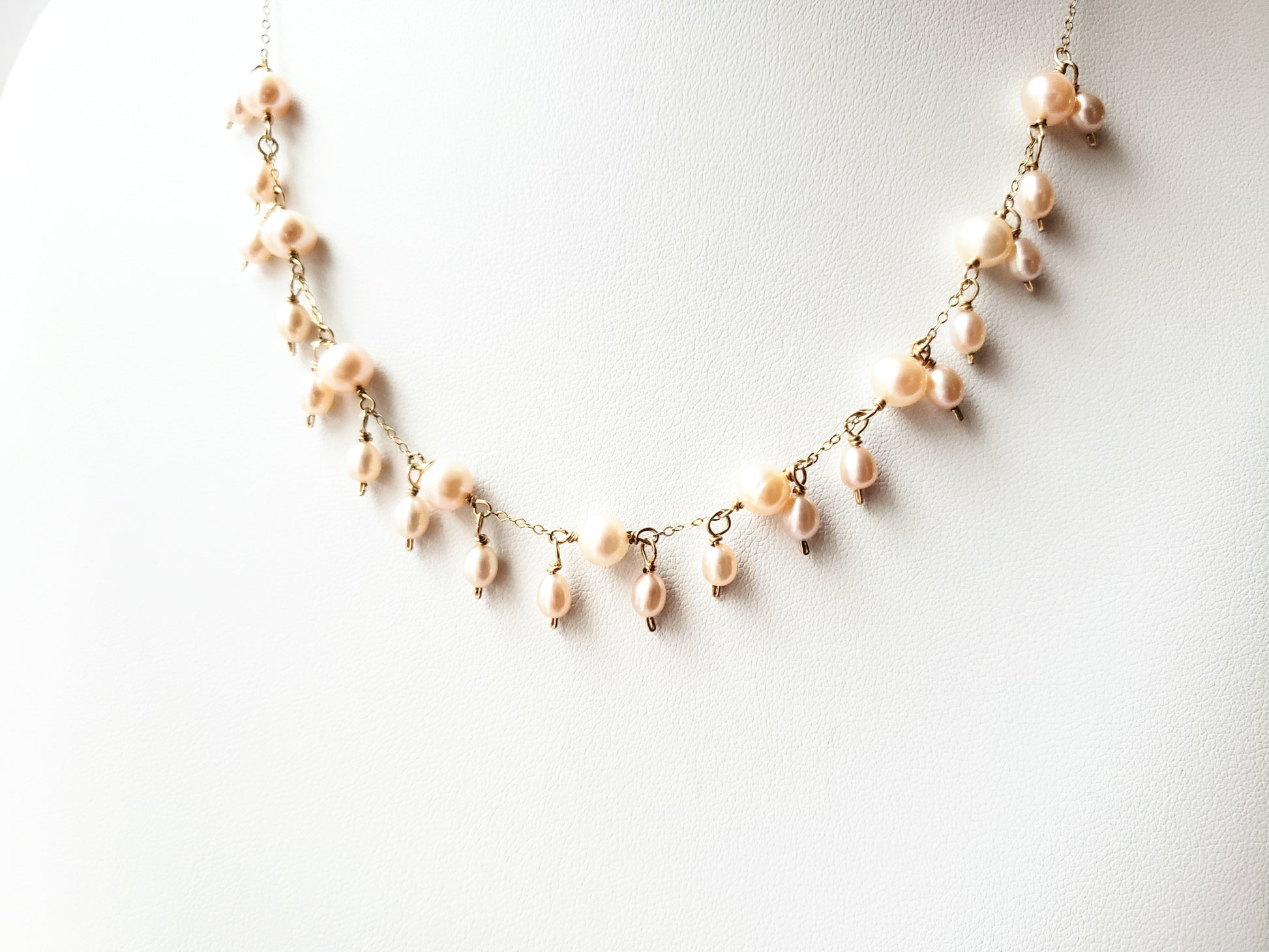 Elegant pale peach color Freshwater Cultured Pearl dangle necklace with small peach pearls and Gold Filled chain