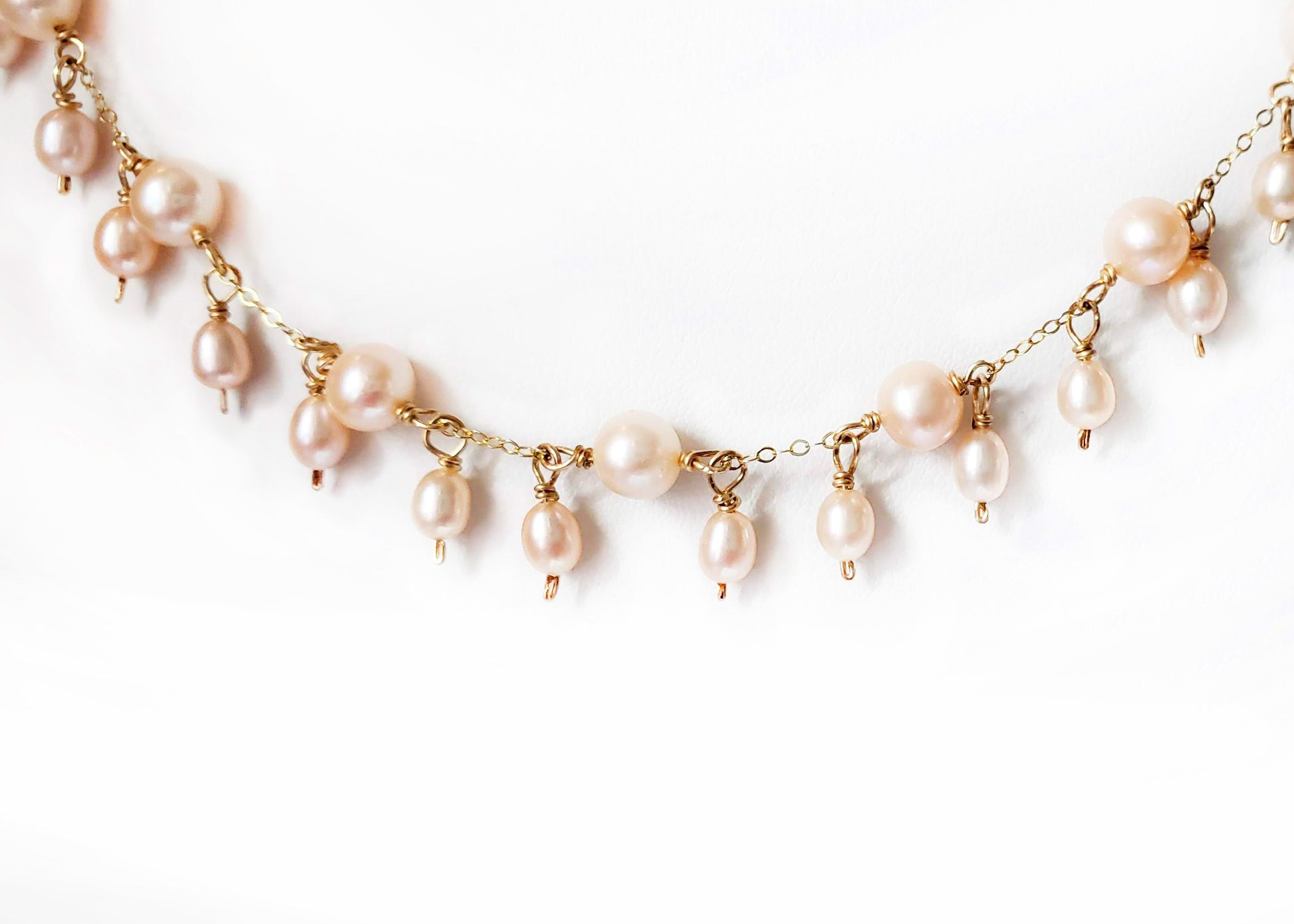 Elegant pale peach color Freshwater Cultured Pearl dangle necklace with small peach pearls and Gold Filled chain