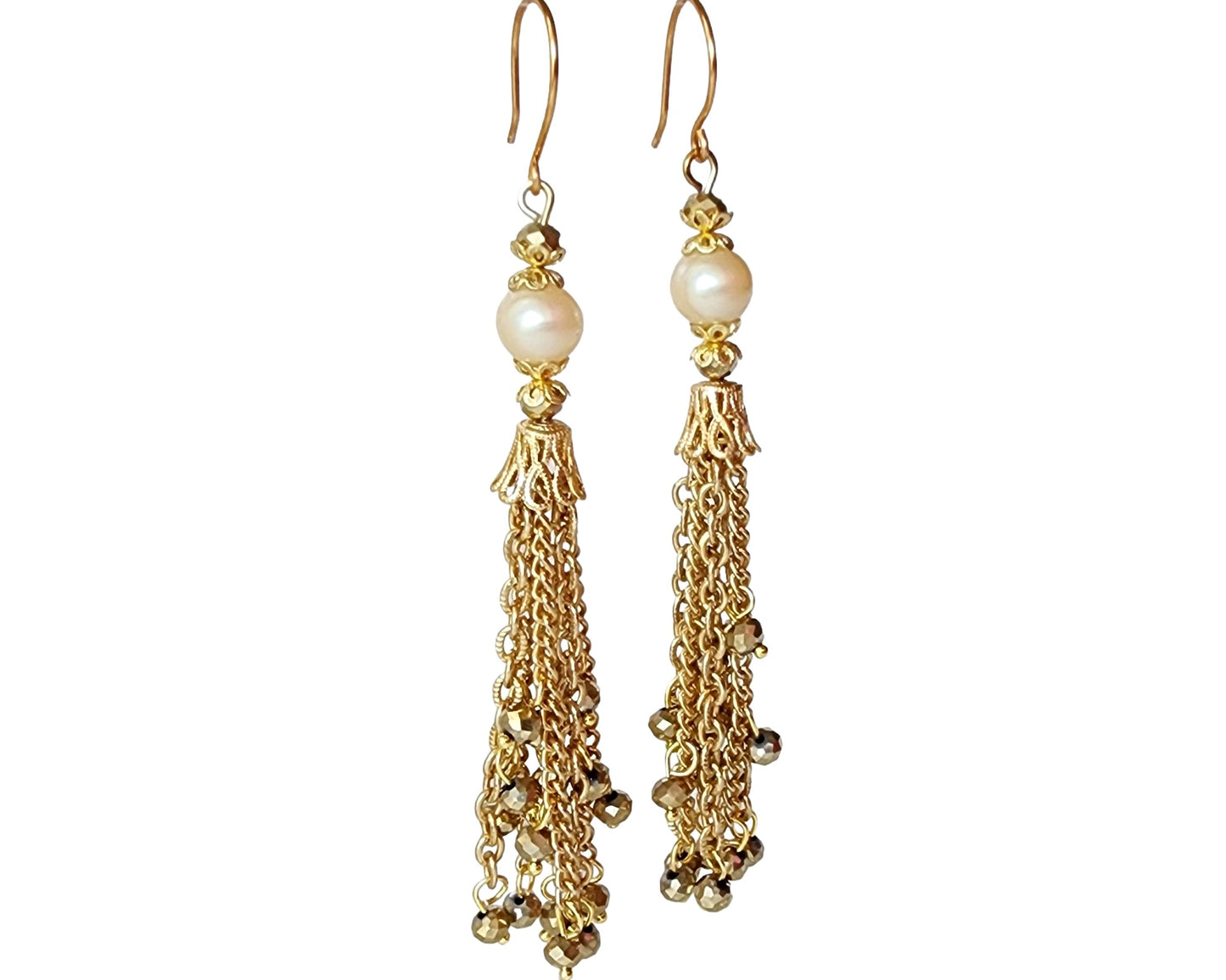 Long Art Deco Style Tassel Earrings, Tassel made with long strands of chains with gold crystals dangling below off white pearls. 