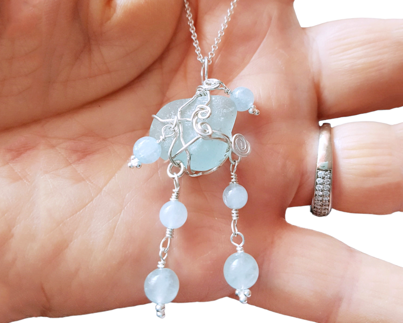Aquamarine Sea Glass/Beach Glass Water Pendant. Wire wrapped aqua blue beach glass pendant with genuine Aquamarine dangles. Pendant on a fine diamond cut rolo chain.  