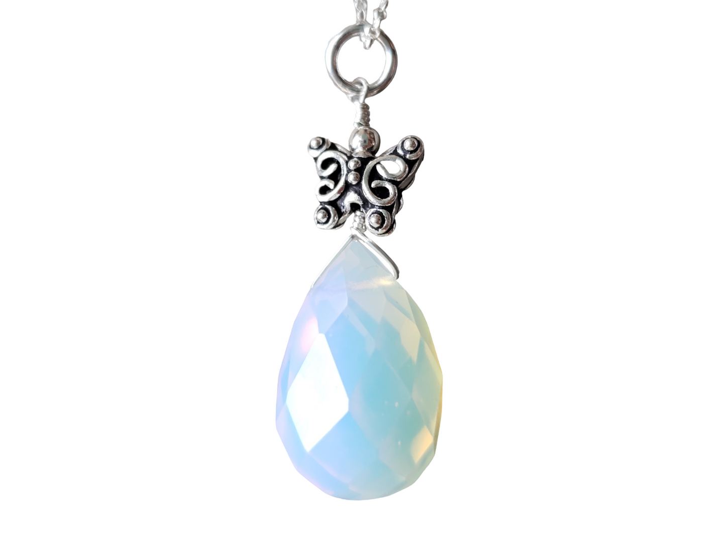 Butterfly Opal Dreams Pendant, Butterfly on top of Large Opalite Drop shape stone, pendant on chain. 