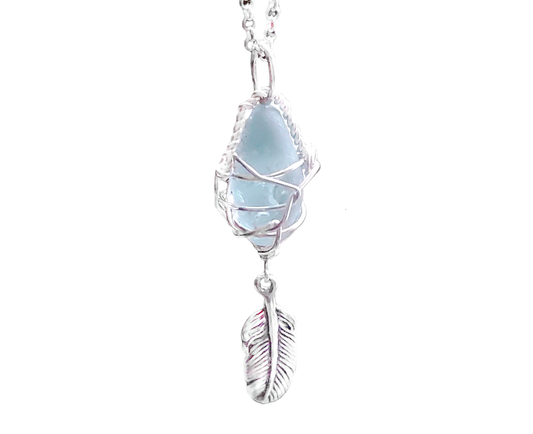 Sterling Silver, Aqua blue Beach Glass (Freshwater Sea Glass) Pendant, Wire Wrapped design with dangling Feather. The pendant dangles in rolo link chain.  