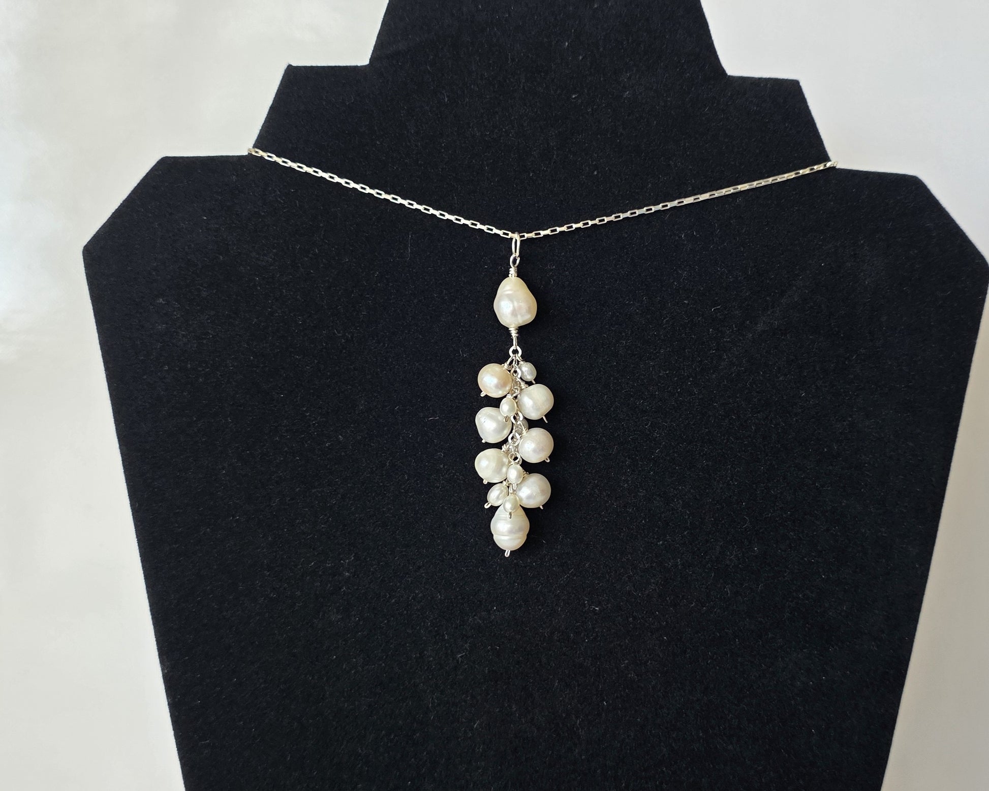 Large white Freshwater Cultured Pearl Cluster Pendant on Sterling Silver chain, on Black background 