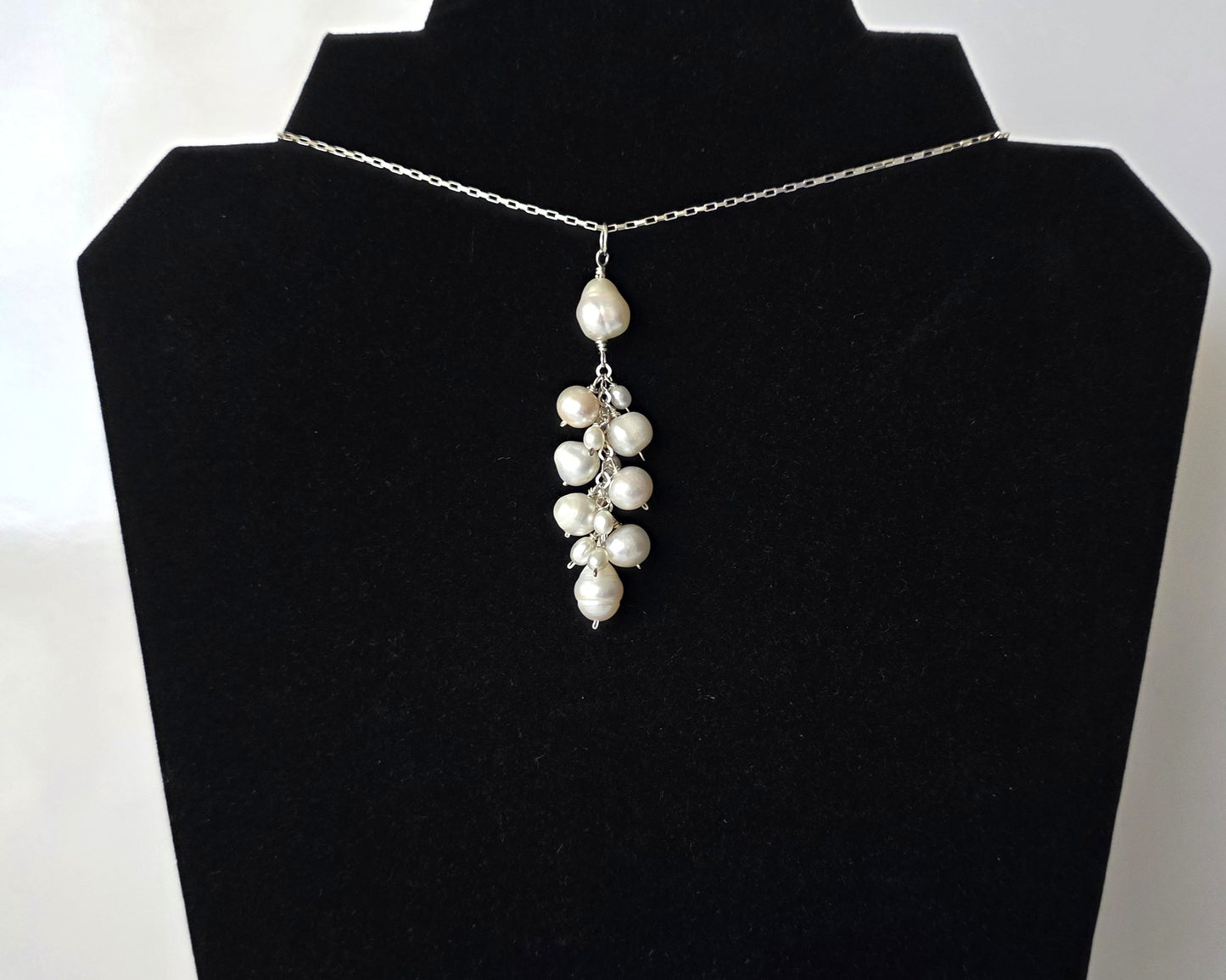 Large white Freshwater Cultured Pearl Cluster Pendant on Sterling Silver chain, on Black background 