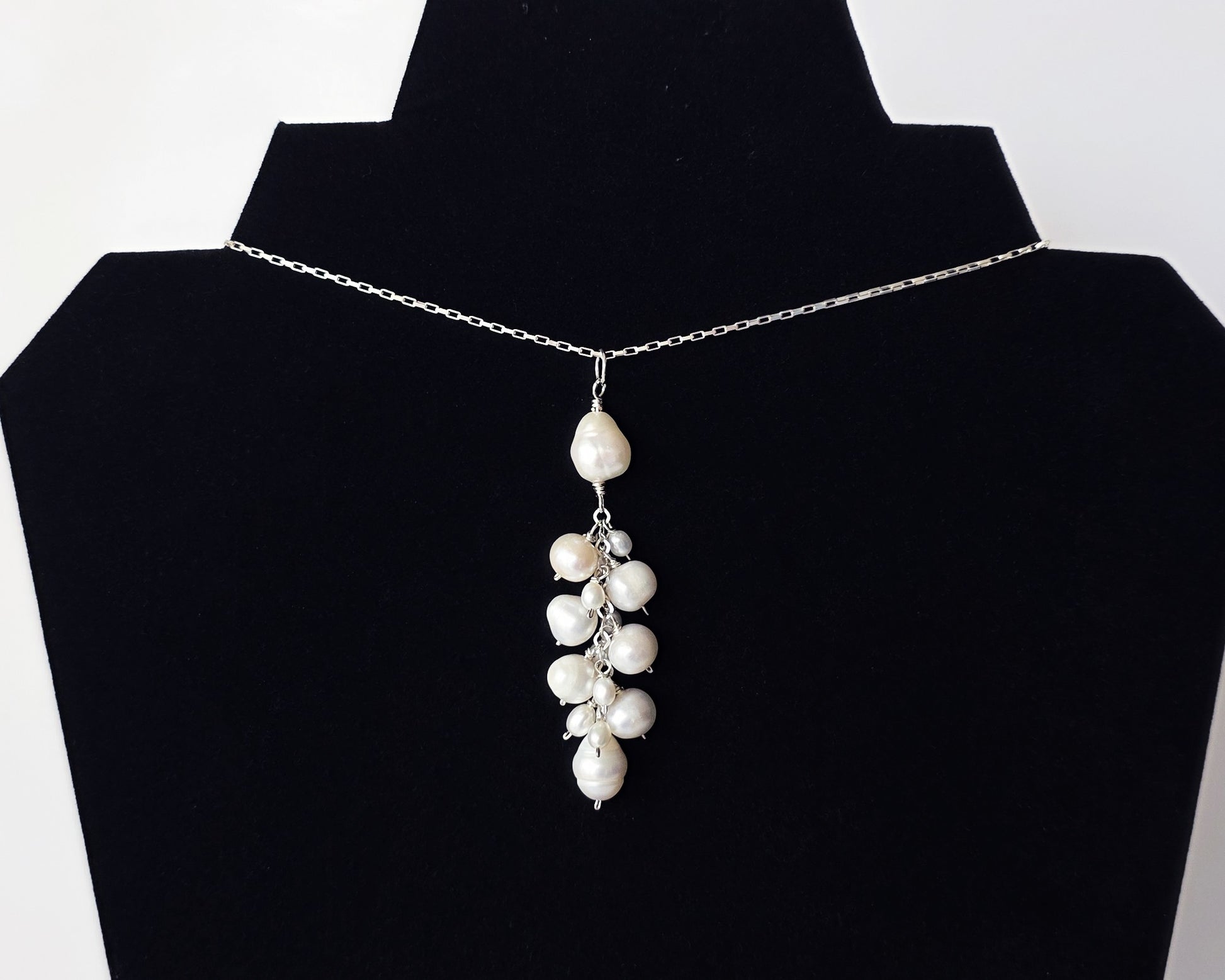 Large white Freshwater Cultured Pearl Cluster Pendant on Sterling Silver chain, on Black background 