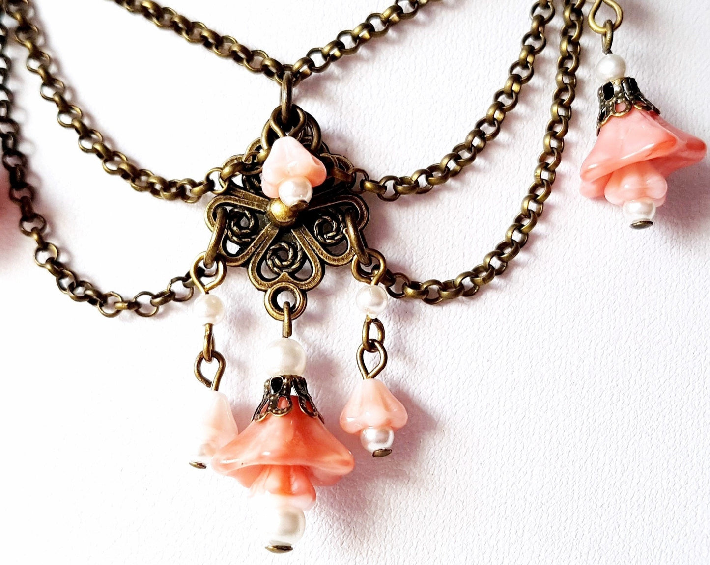 Victorian Style Rose Pink Flower Festoon Necklace and Earring Set with peach pink flower dangles and swags of antiqued brass chain.
