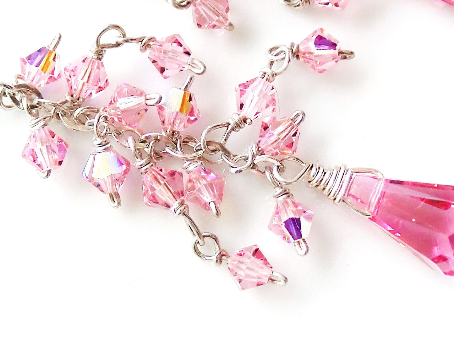 Long Pink Crstal Dangle Cluster Earrings, Sterling Silver, 4mm Rose Pink AB crystals dangling in loose cluster above drop shaped crystals. Lever back earring hooks. 