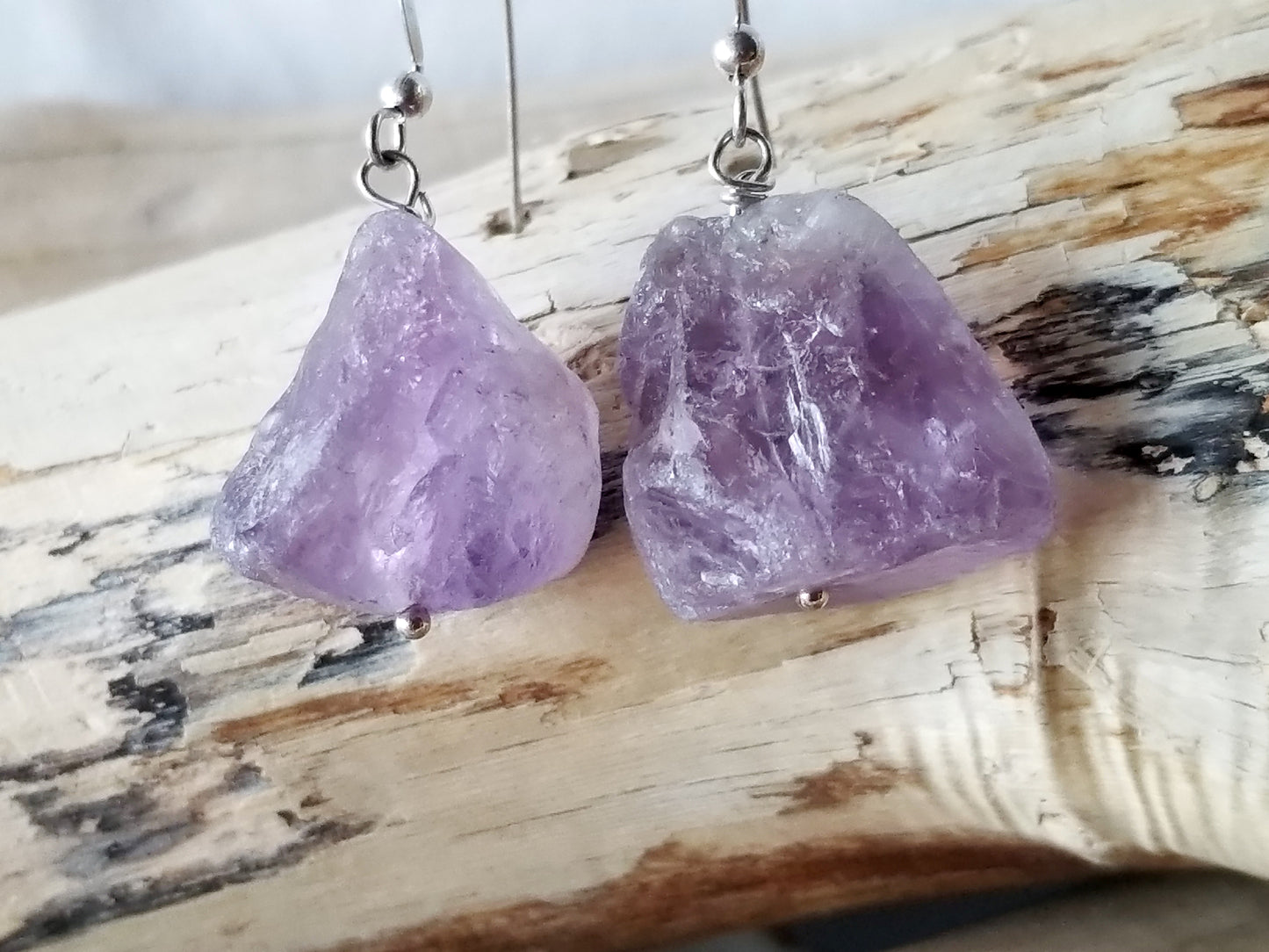 Lavender Amethyst Nugget Dangle Earrings, Sterling Silver French Earring Hooks, displayed on wood background