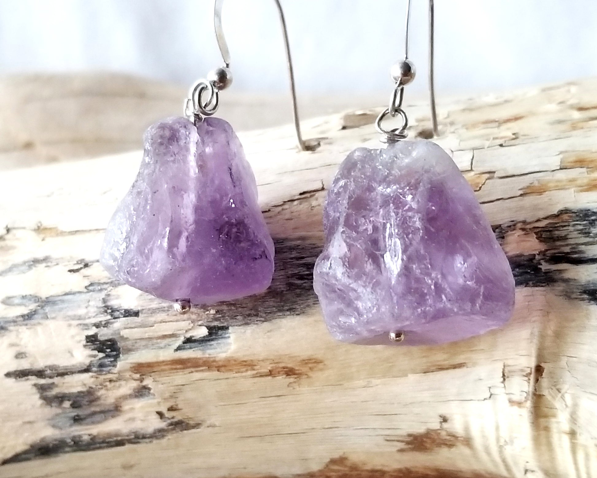 Lavender Amethyst Nugget Dangle Earrings, Sterling Silver French Earring Hooks, displayed on wood background