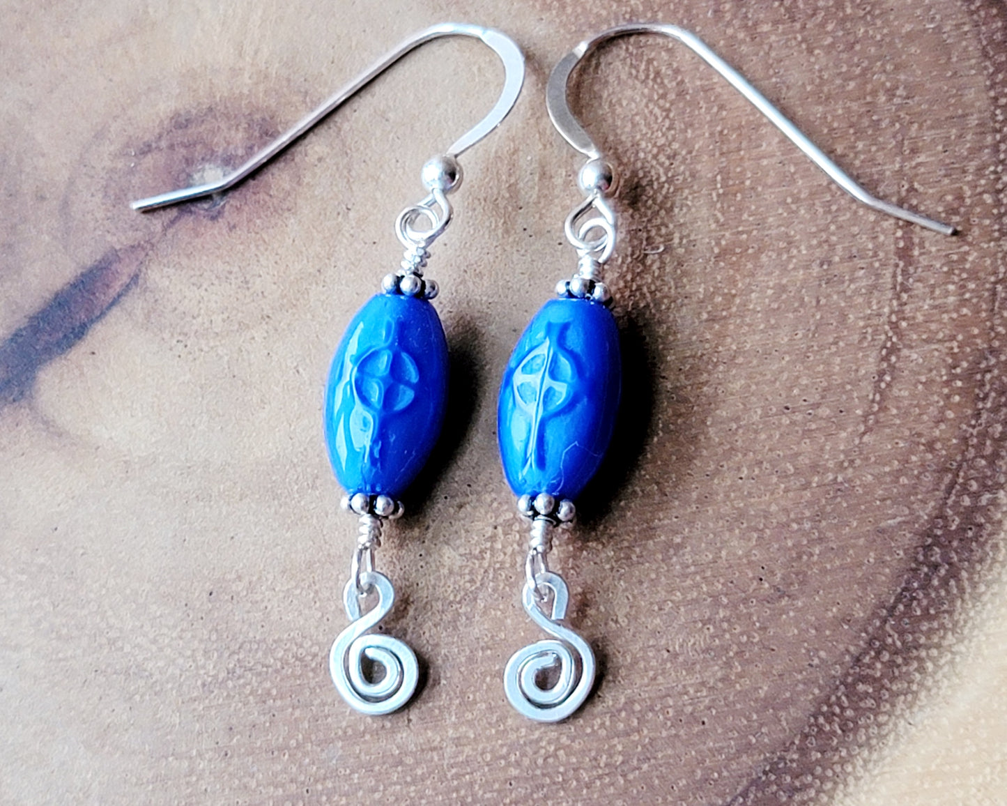 Long Dangly Christian Earrings made with Blue Glass Celtic Cross Earrings with Sterling Silver Celtic Coils.