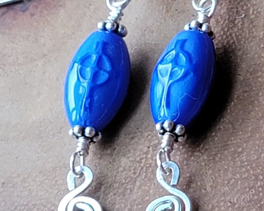 Long Dangly Christian Earrings made with Blue Glass Celtic Cross Earrings with Sterling Silver Celtic Coils.