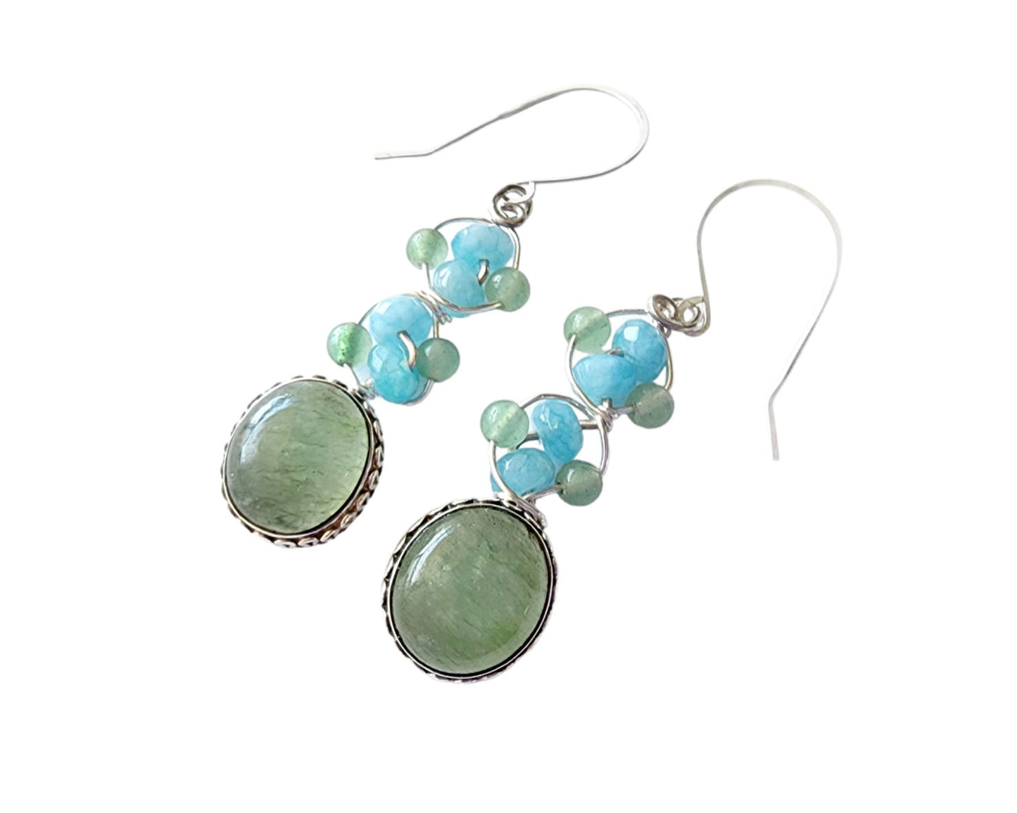 Long Dangle Earrings with large oval shaped Aventurine stones (soft green color) with a long design with blue Quartz and Aventurine beads and Sterling Silver. On French style earring hooks. 