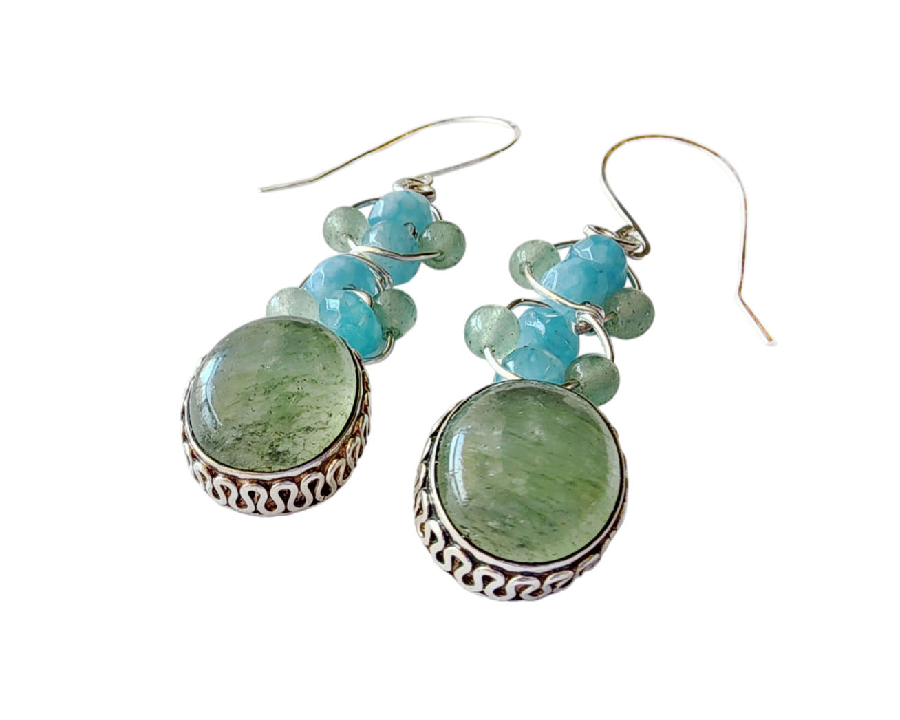 Long Dangle Earrings with large oval shaped Aventurine stones (soft green color) with a long design with blue Quartz and Aventurine beads and Sterling Silver. On French style earring hooks. 