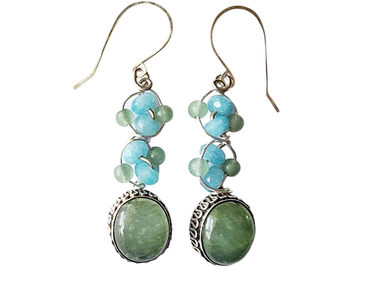 Long Dangle Earrings with large oval shaped Aventurine stones (soft green color) with a long design with blue Quartz and Aventurine beads and Sterling Silver. On French style earring hooks. 