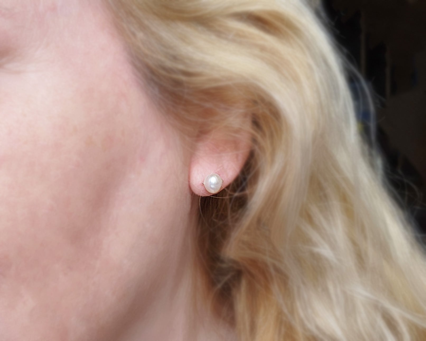 White Pearl Post Earrings on Ear