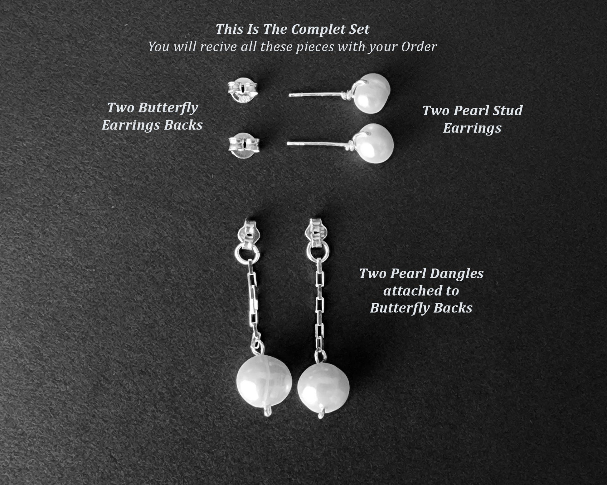 Convertible Sterling Silver Freshwater Cultured Peal Dangle and Post Earrings with Large pearls on the end of a long chain on black background 
