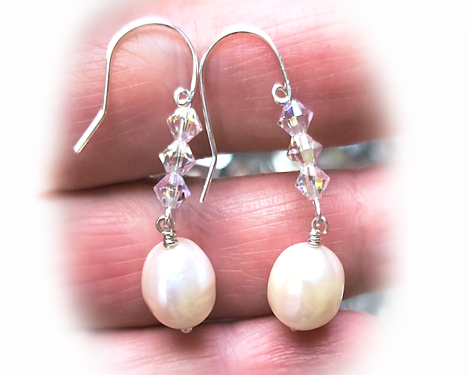 White pearl clear AB Crystal threader dangle style earrings Silver french hooks with three clear AB crystals and large white pearl dangles on hand 