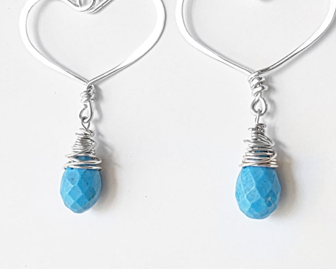 Hoop like Hearts and dangling Howlite drop shape stone, displayed on white background.