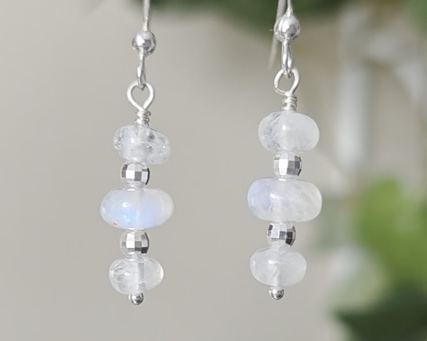 Sterling Silver Dangle Earrings with Three milky white Moonstones with blue and Sterling Silver sparkly beads dangling from silver French earring hooks 