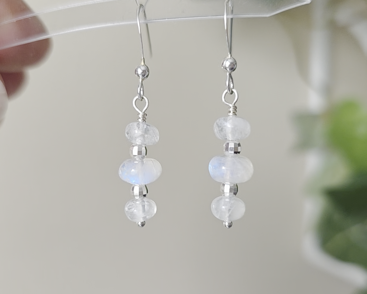 Sterling Silver Dangle Earrings with Three milky white Moonstones with blue and Sterling Silver sparkly beads dangling from silver French earring hooks