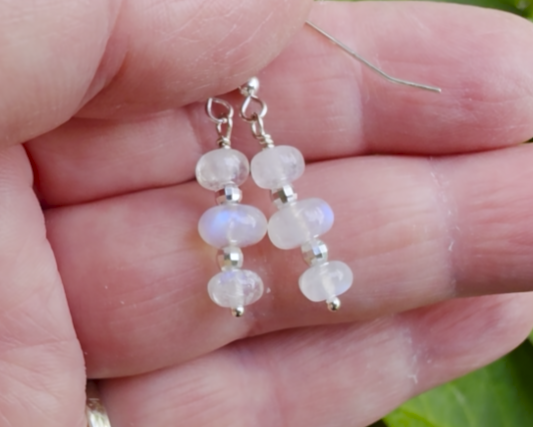 Sterling Silver Dangle Earrings with Three milky white Moonstones with blue and Sterling Silver sparkly beads dangling from silver French earring hooks 