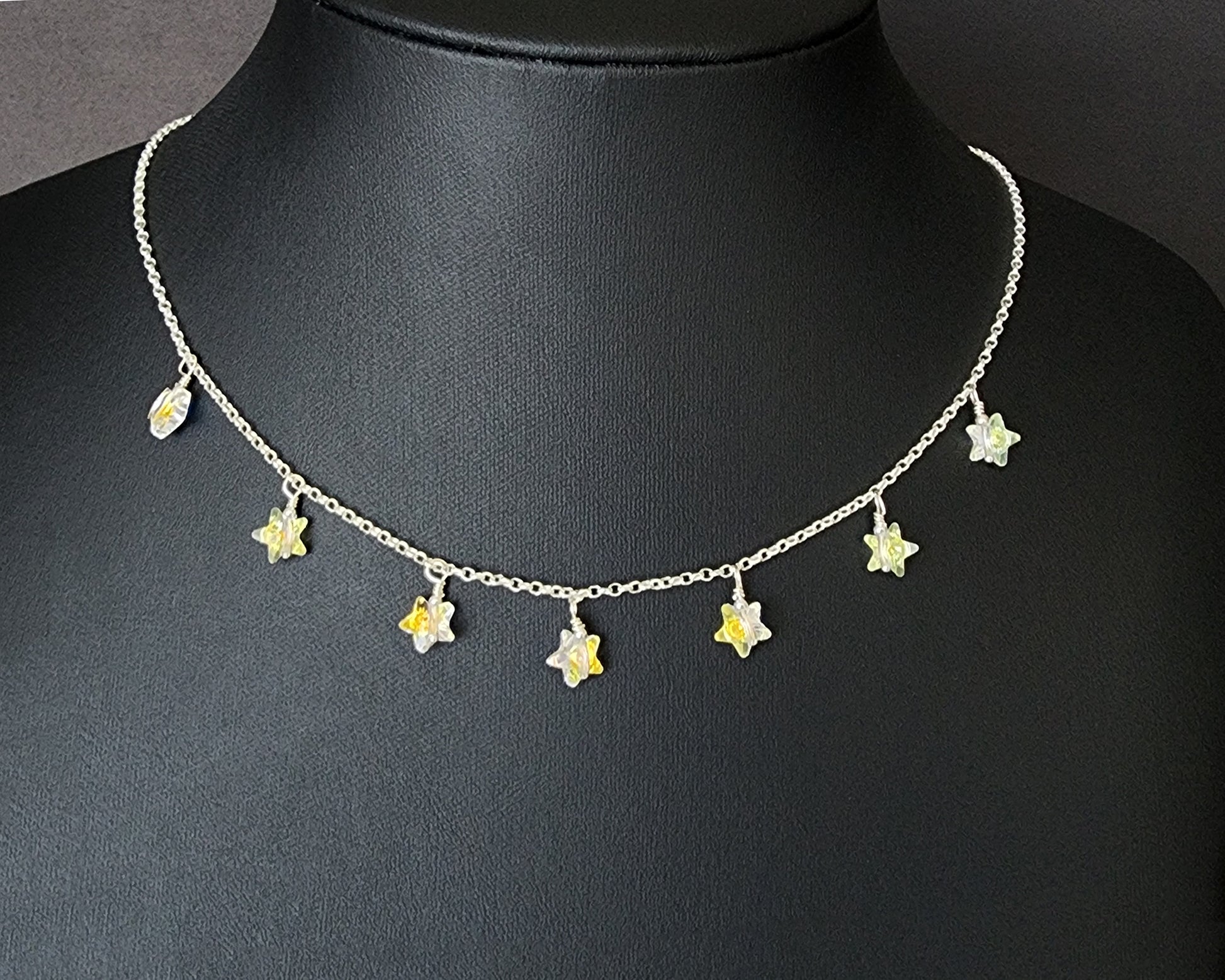 Brilliant Seven Stars Crystal Dangle Necklace with seven clear AB Austrian Crystal Stars on Sterling Silver chain.  